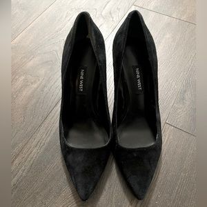 Women’s black suede pumps
